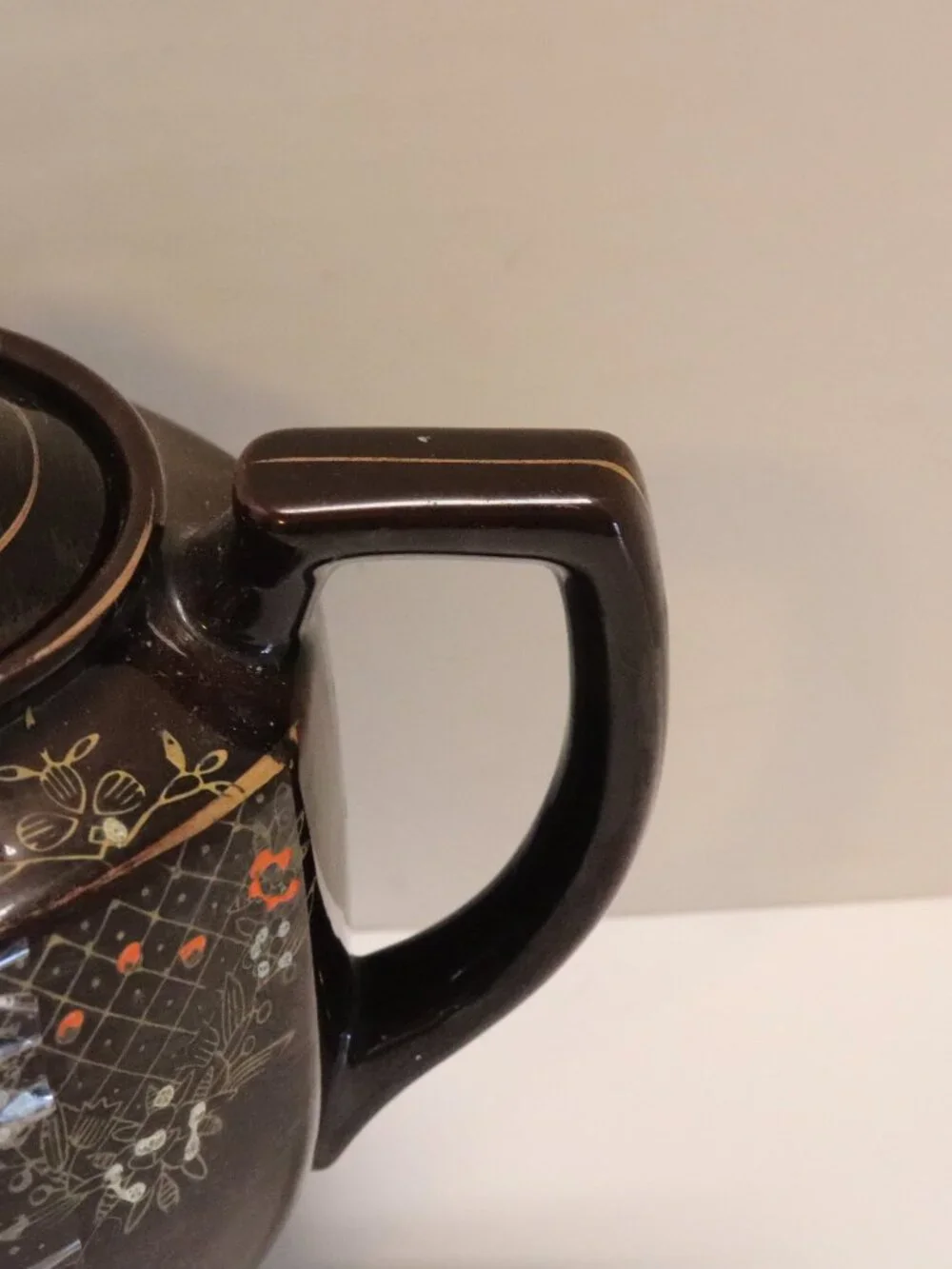 A Porcelain Pitcher made in Japan with Japan Written on Bottom Black