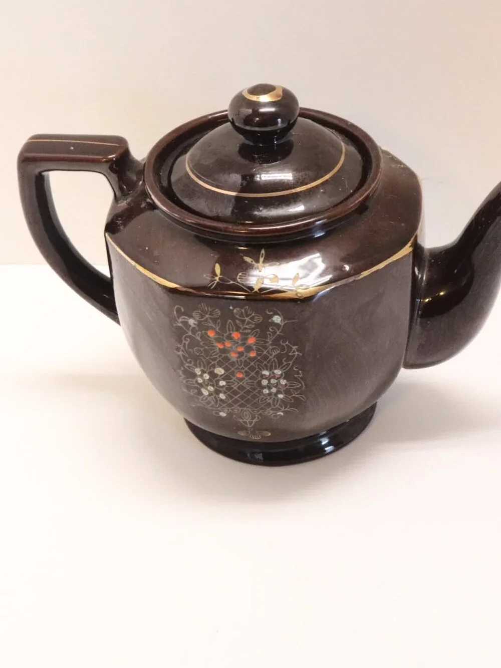 A Porcelain Pitcher made in Japan with Japan Written on Bottom Black