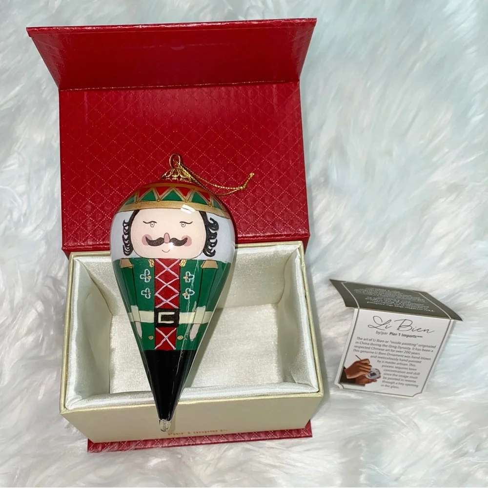 Li Bien Pier 1 Nutcracker Glass Ornament 2017