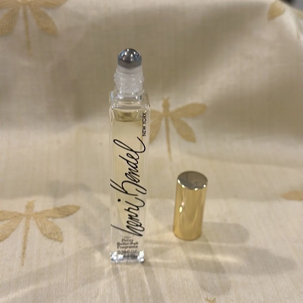 Henri Bendel Spring Blossom & Agave Roller Ball. Needs twice by me. 0.28 fl. oz.