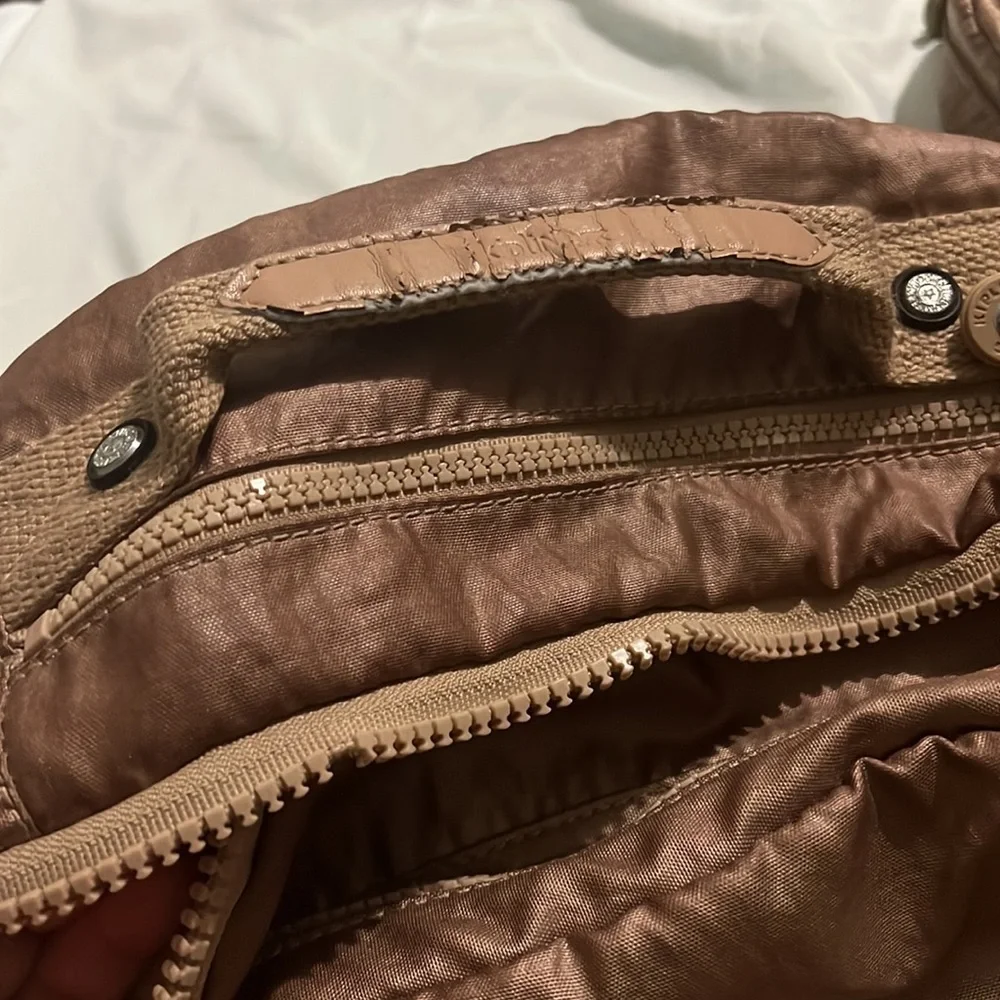 Kipling gold backpack
