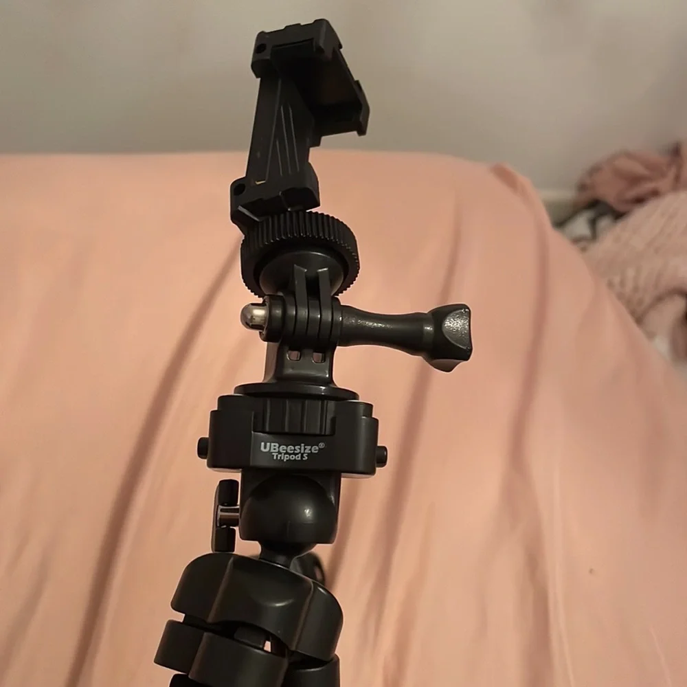 UBeesize 3 legged tripod, black and white with Bluetooth remote.
