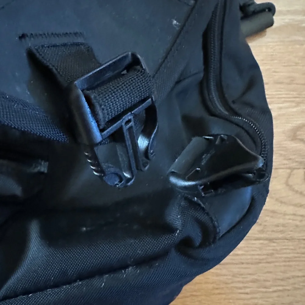REI black messenger