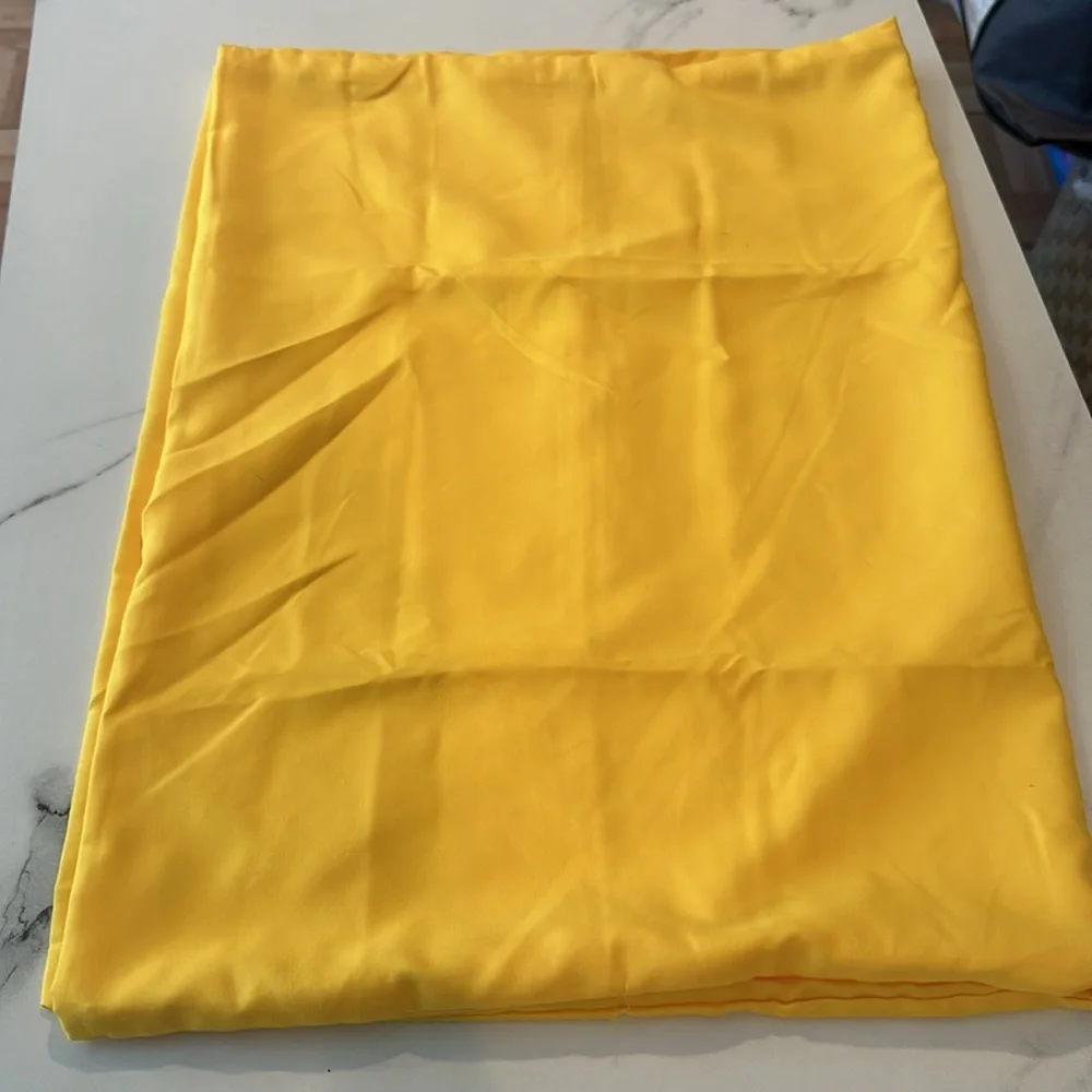 One new in bag yellow queen size pillow case