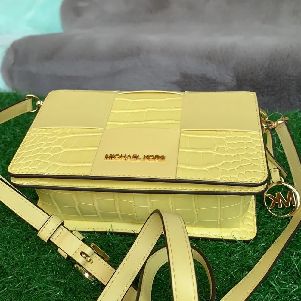 Michael Kors 75”h boasts tactile
