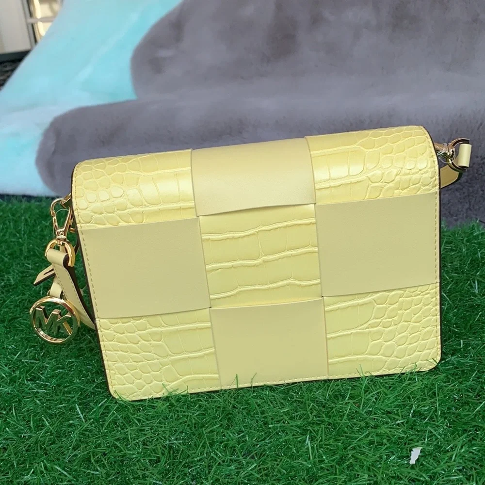 Michael Kors while spacious pocket