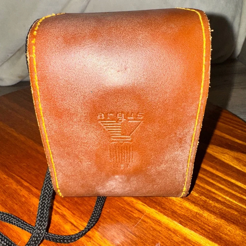 Argus featuring leather