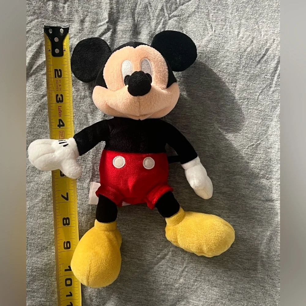 Small Mickey Mouse stuff animal with little bean bag in butt