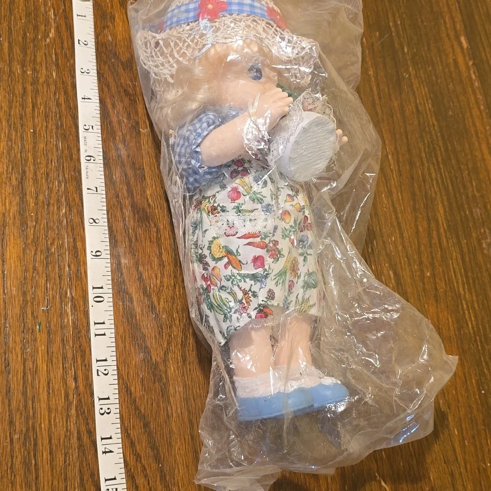 Precious Moments dolls pictures garden