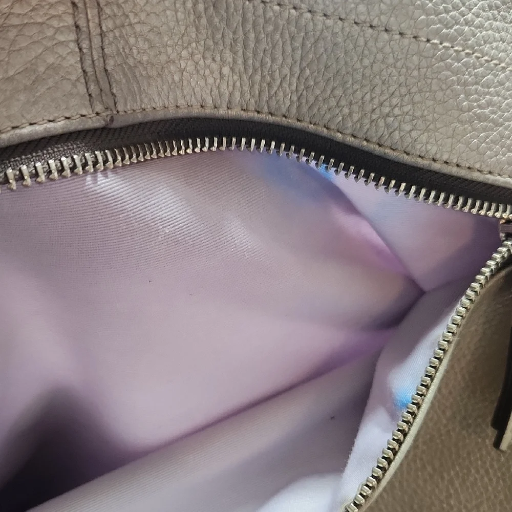 Coach pocket inside above