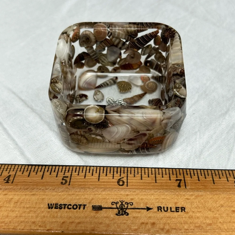 Shell and resin contemporary functional art pieces for the vanity or office