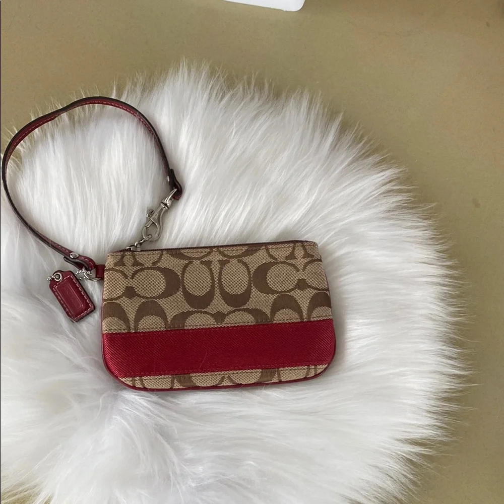 EUC Coach Red and Tan Wristlet with the iconic”C” Signature Monogram
