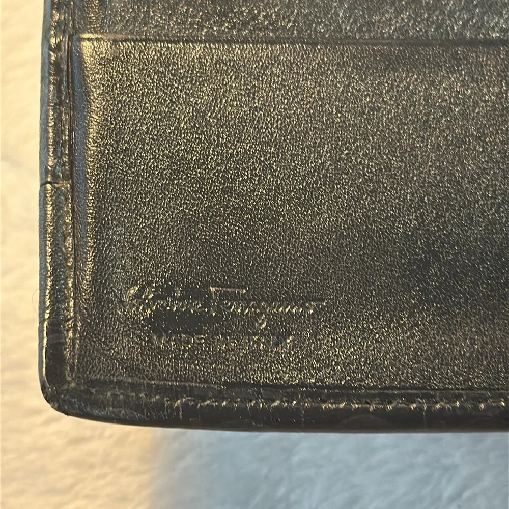 Salvador Ferragamo black bifold wallet.
