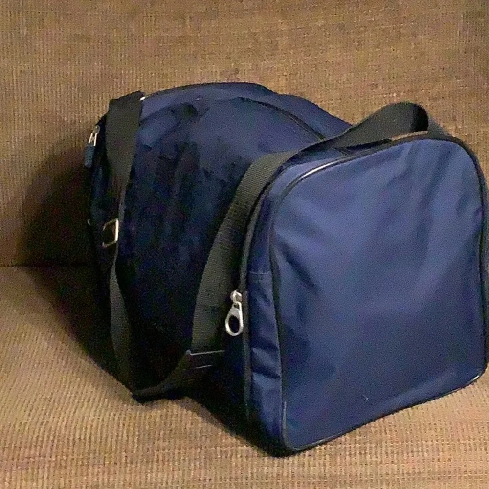 American Tourister Navy collapsible duffle bag