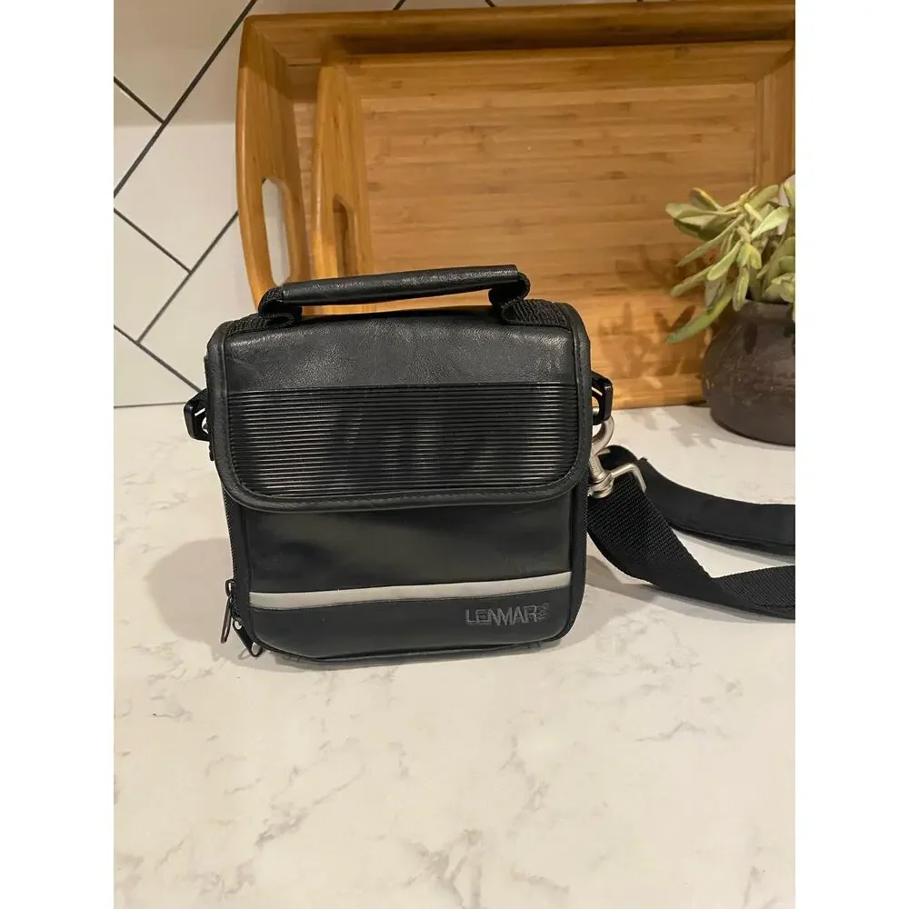 Lenmar faux leather shoulder camera bag hand held or shoulder strap vintage?