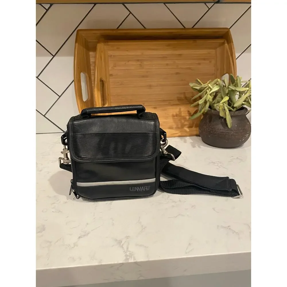 Lenmar faux leather shoulder camera bag hand held or shoulder strap vintage?