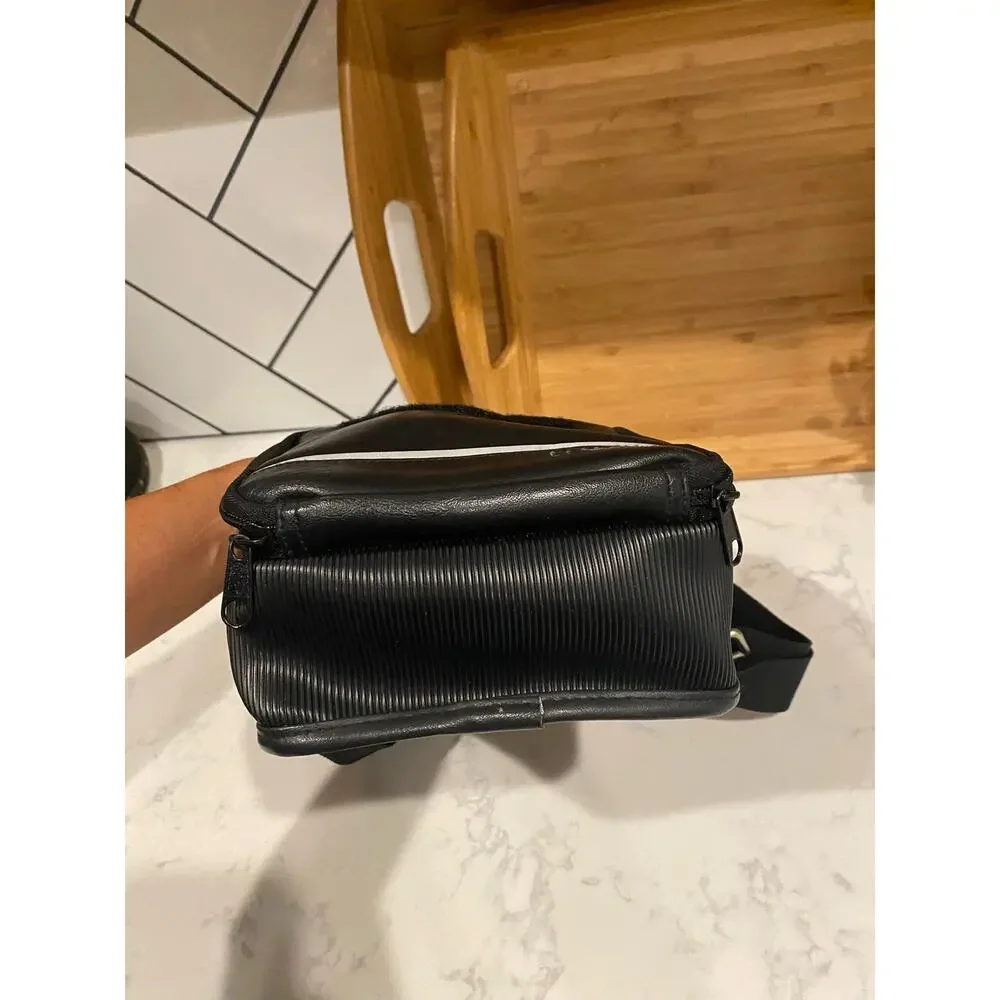 Lenmar faux leather shoulder camera bag hand held or shoulder strap vintage?