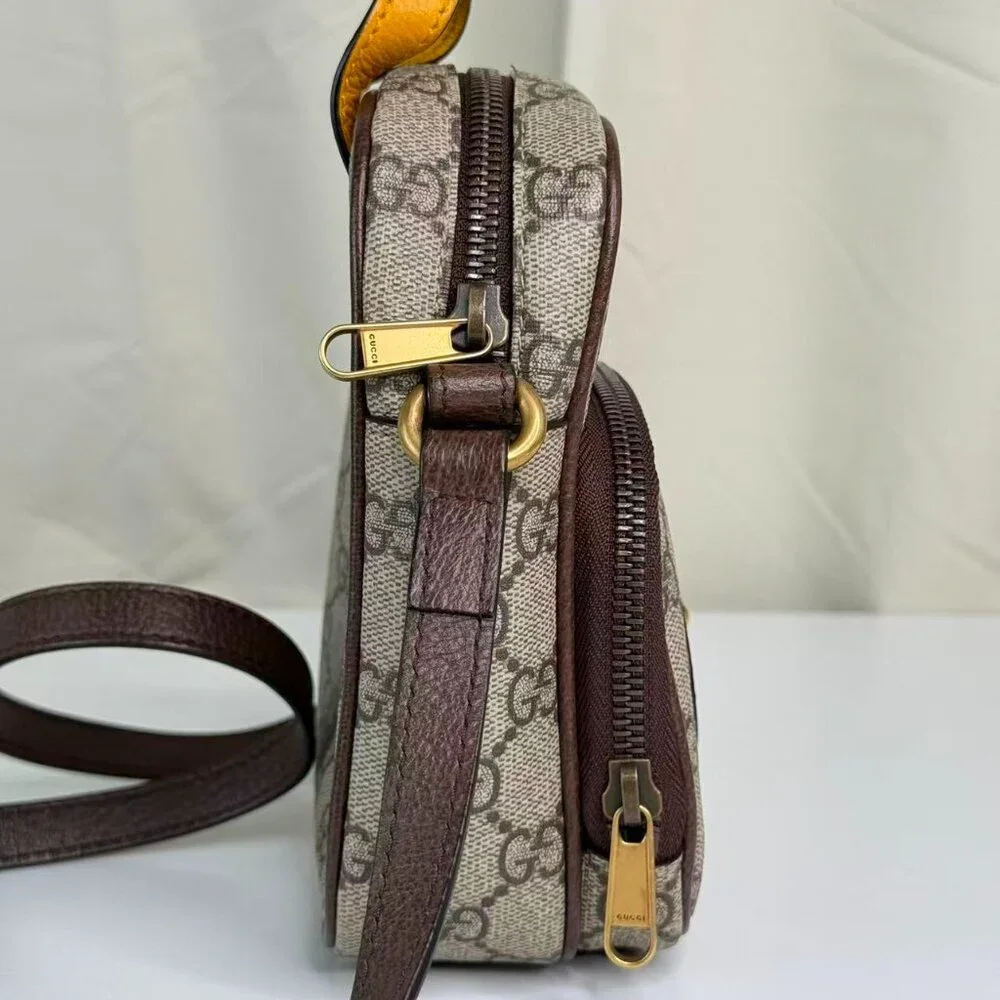 Gucci GG Logo Supreme Vintage Neo Shoulder Bag Crossbody with Gold Lion Emblem