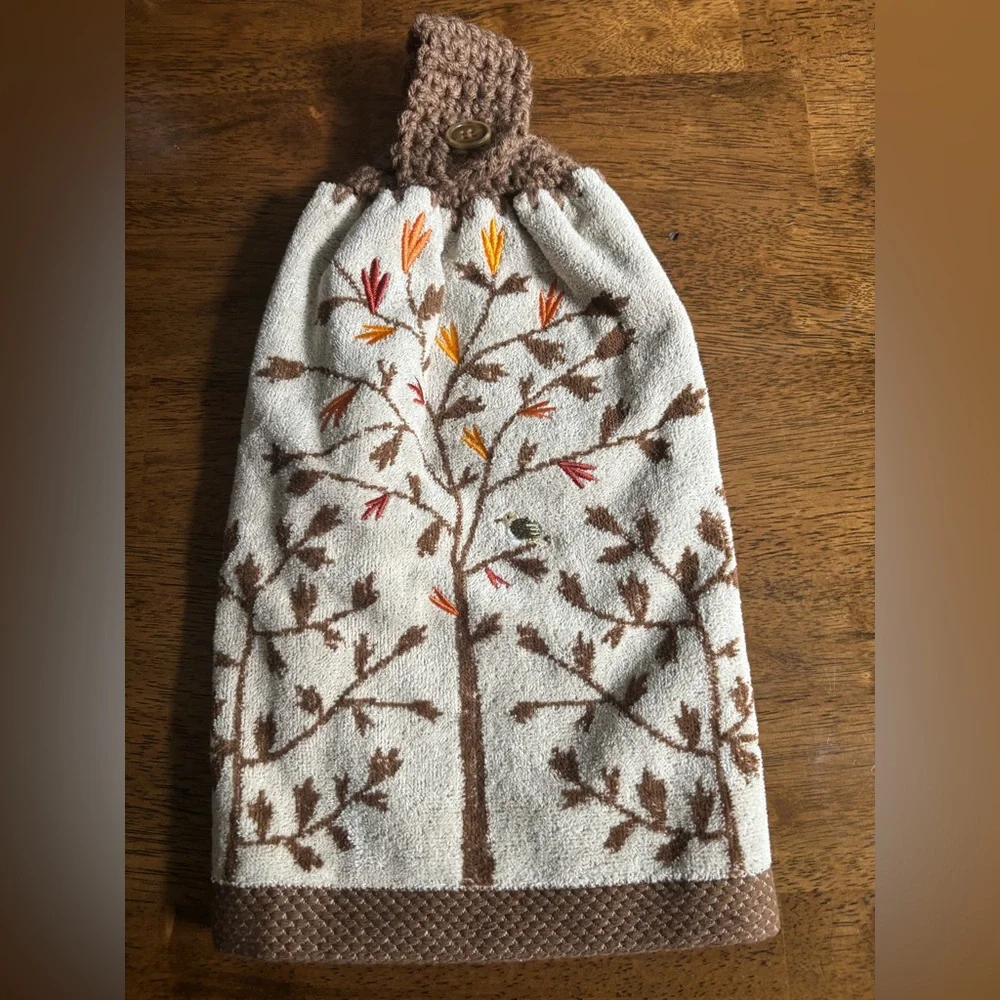 Hand crocheted fall tan/brown towel with embroidered leaves and bird