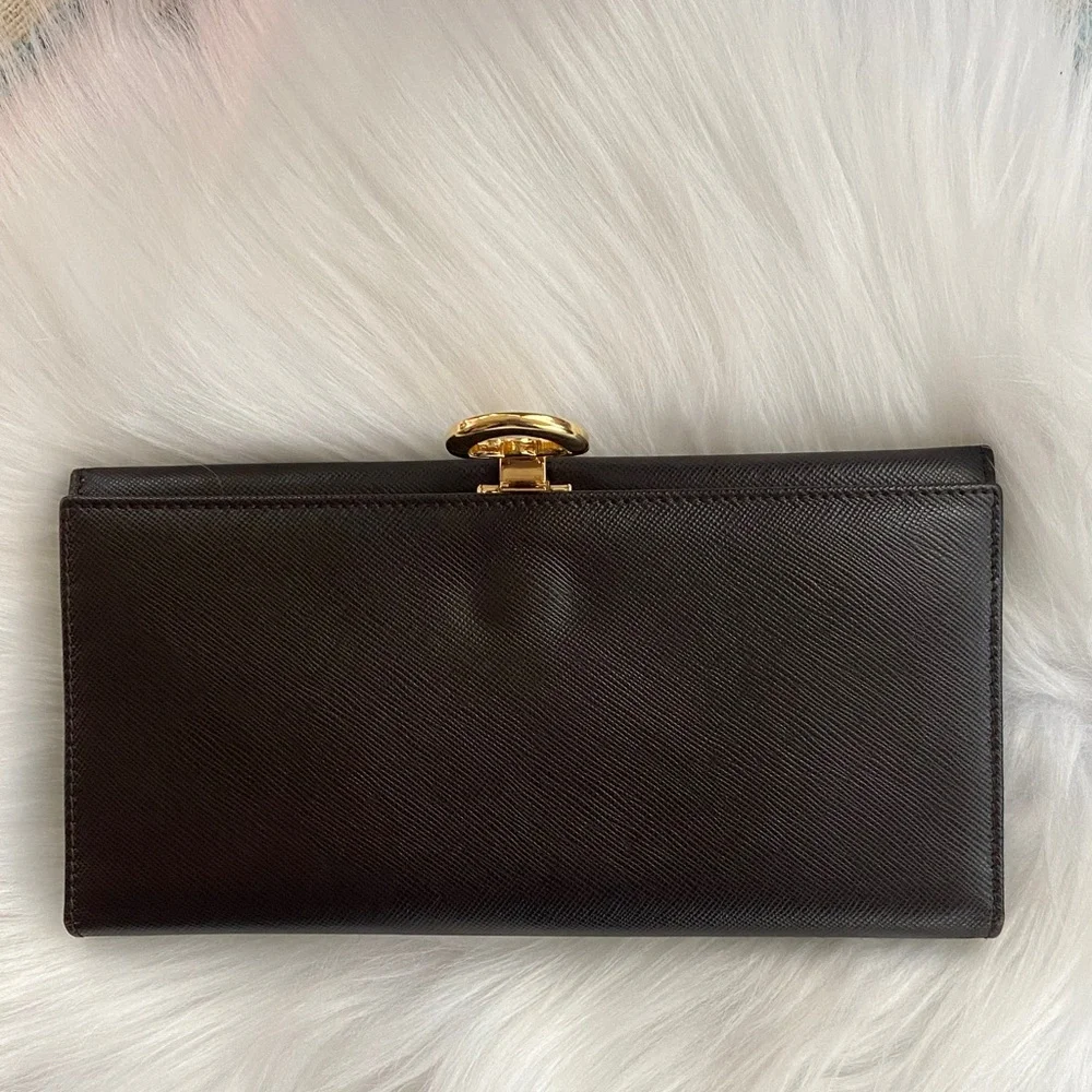 Salvatore Ferragamo Deep brown leather wallet with gold accent