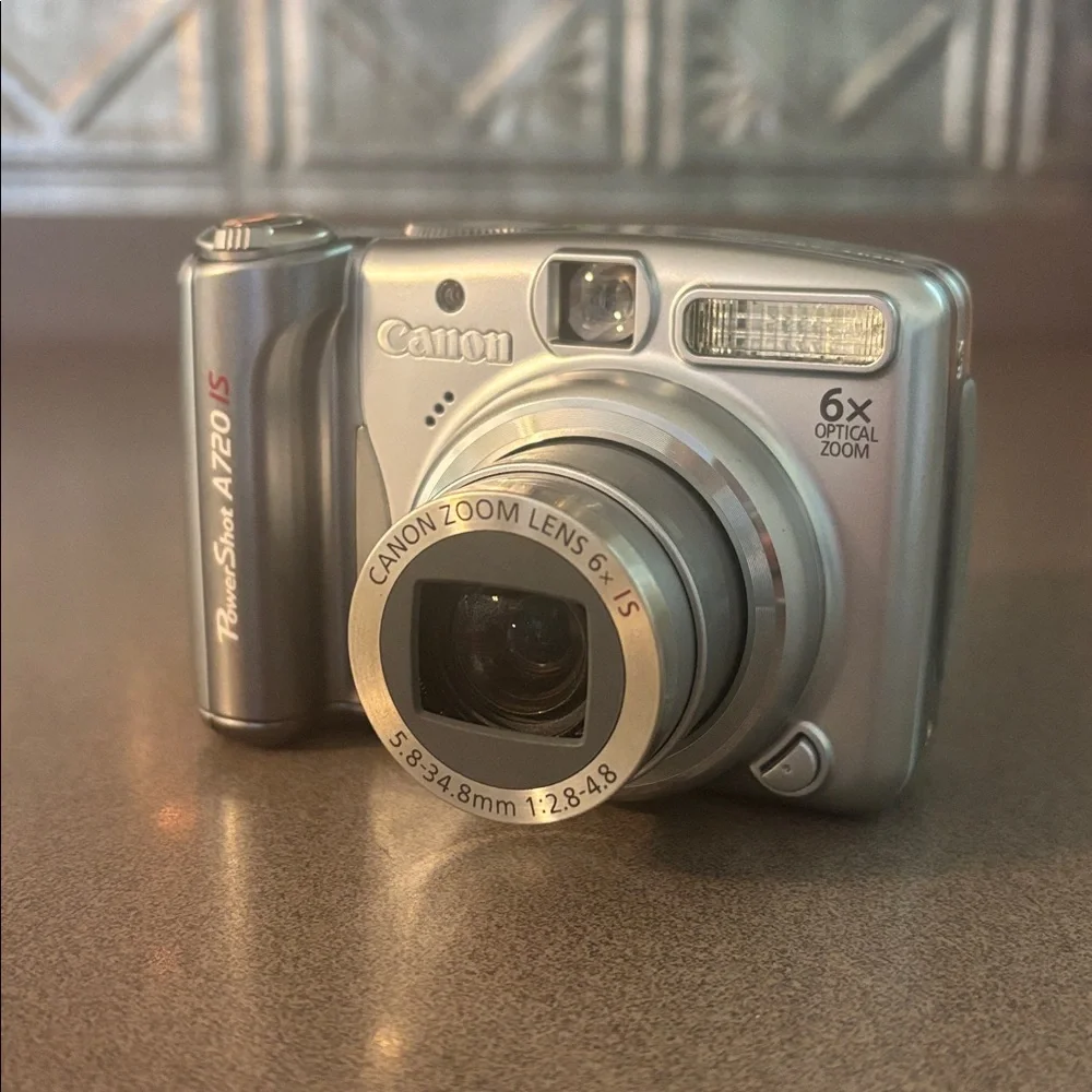 Canon A720 IS Silver Digital Camera / Video Recorder (and case)