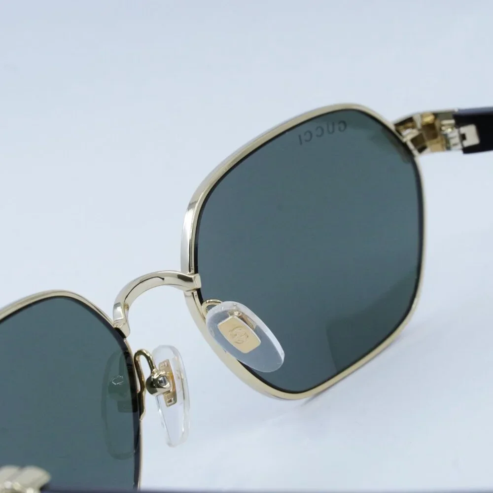 Gucci GG1593S 001 Sunglasses Endura Gold Oval Frame, Grey Lenses