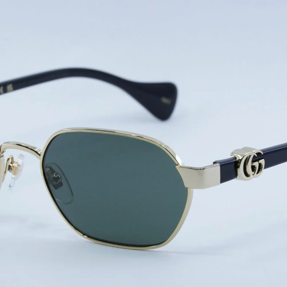 Gucci GG1593S 001 Sunglasses Endura Gold Oval Frame, Grey Lenses