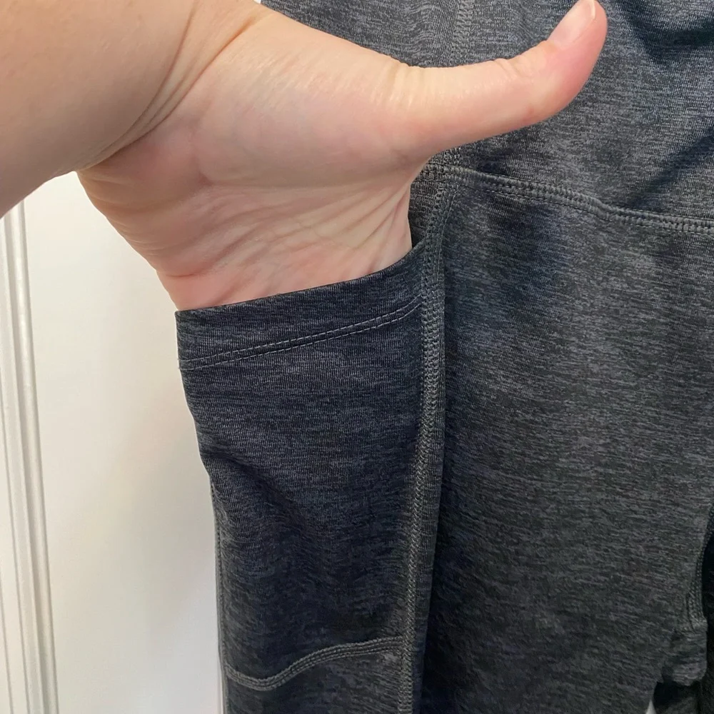 Avia grey leggings with leg pockets. Size Large. Made with recycled polyester