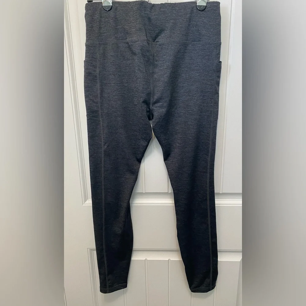 Avia grey leggings with leg pockets. Size Large. Made with recycled polyester