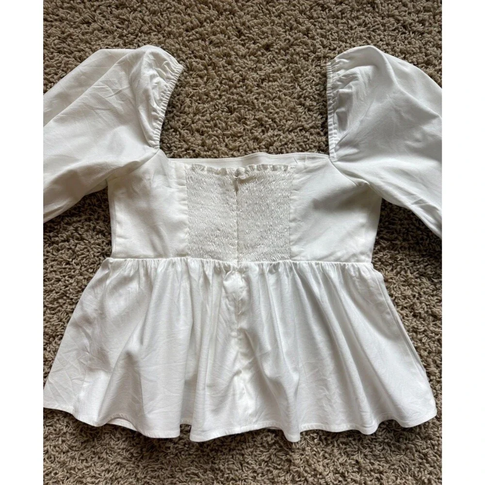 Reformation neckline it