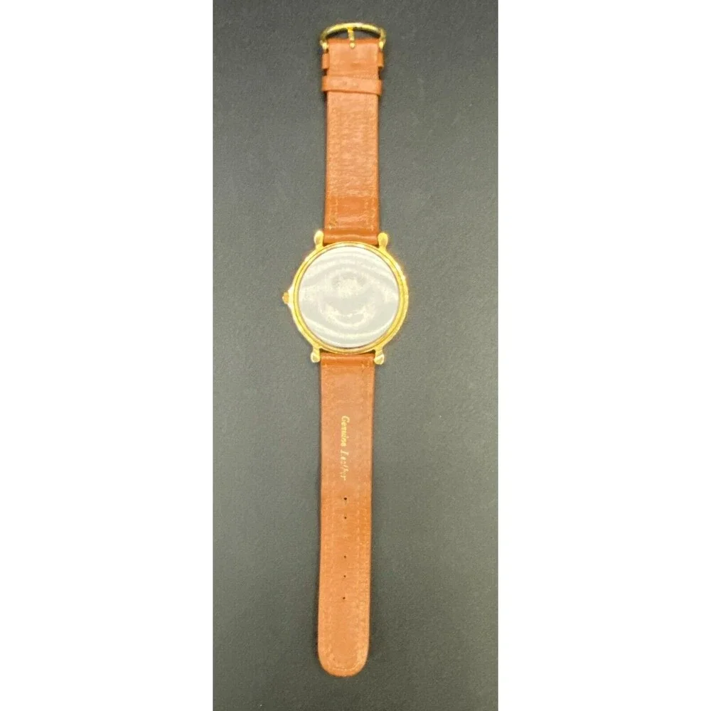 Quemex gold tone