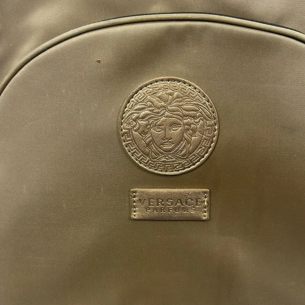 Versace clean holes inside