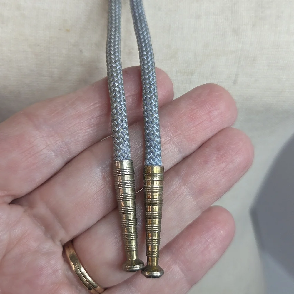 vtg bell trading post solid copper native dancer bolo tie grey cloth cord southw