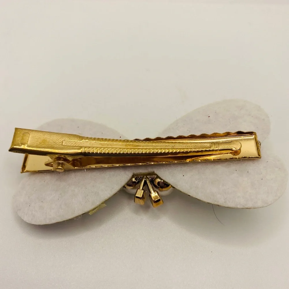 Hair barrette bow faux pearls crystals iri…