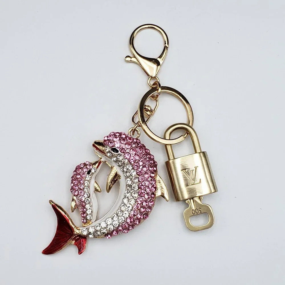 Authentic Louis Vuitton Gold Lock 🔒 Unbranded Dolphine Keychain Bag Charm LV