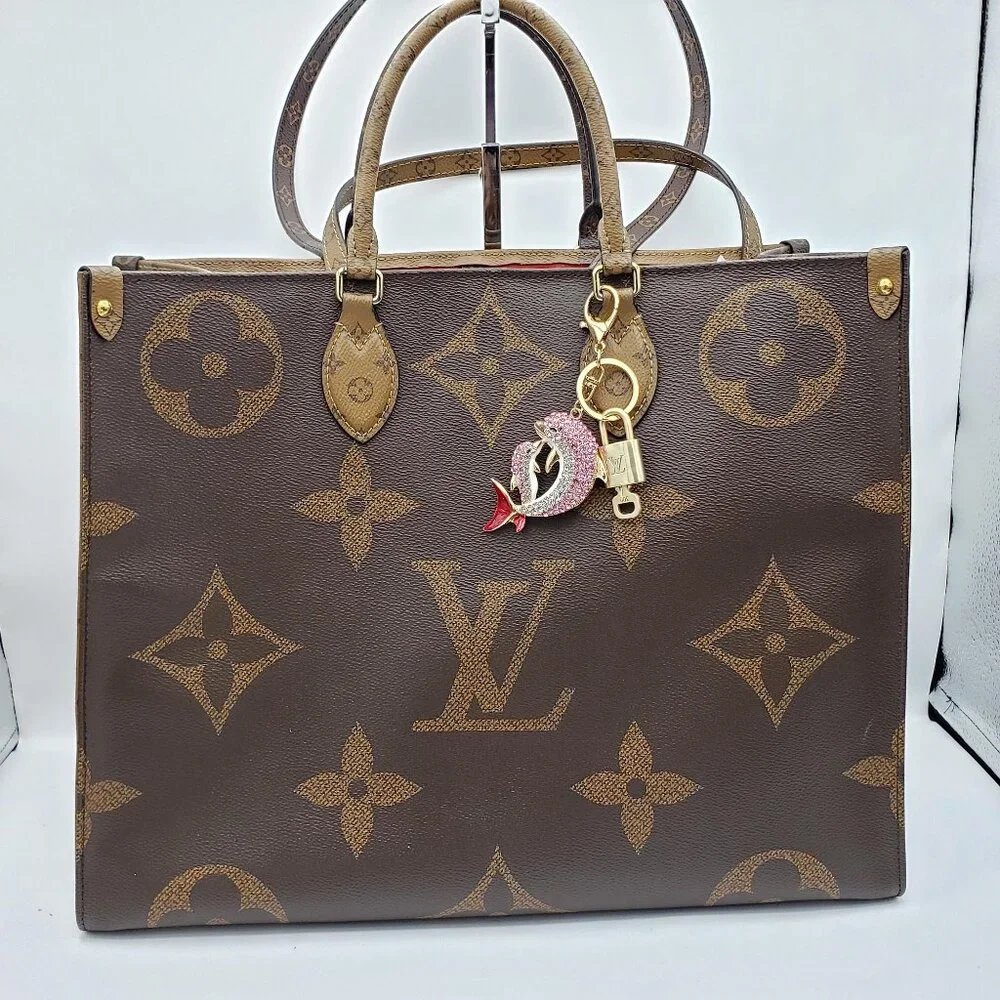 Authentic Louis Vuitton Gold Lock 🔒 Unbranded Dolphine Keychain Bag Charm LV