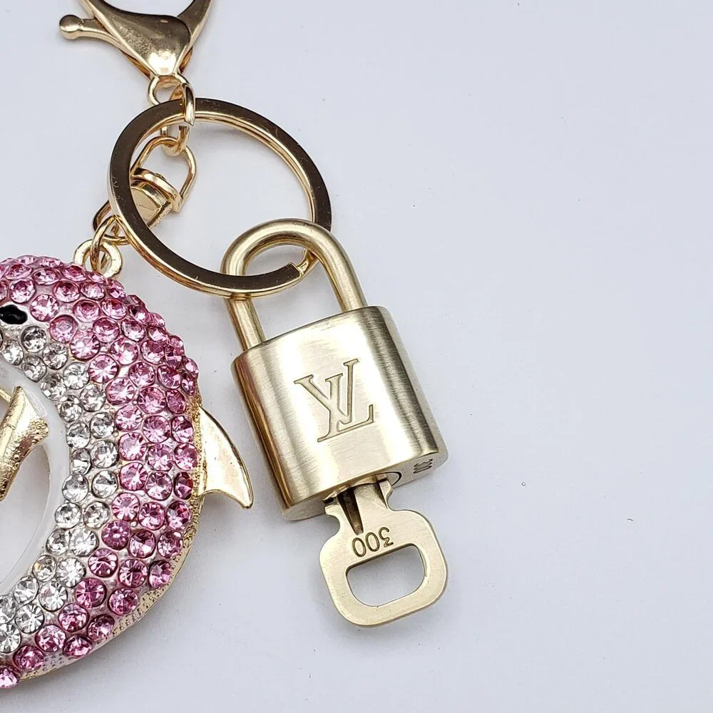Authentic Louis Vuitton Gold Lock 🔒 Unbranded Dolphine Keychain Bag Charm LV