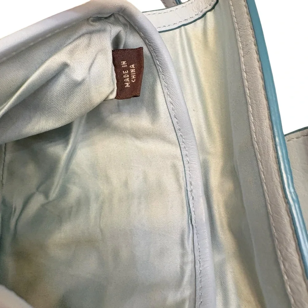 Coach vintage y2k canvas and blue leather wristlet clutch bag soho buckle