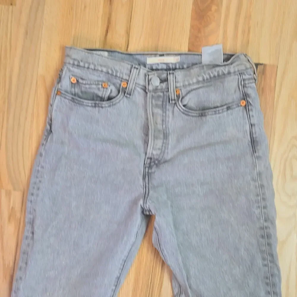 Levi Strauss & Co women's Gray Wedgie Size 27