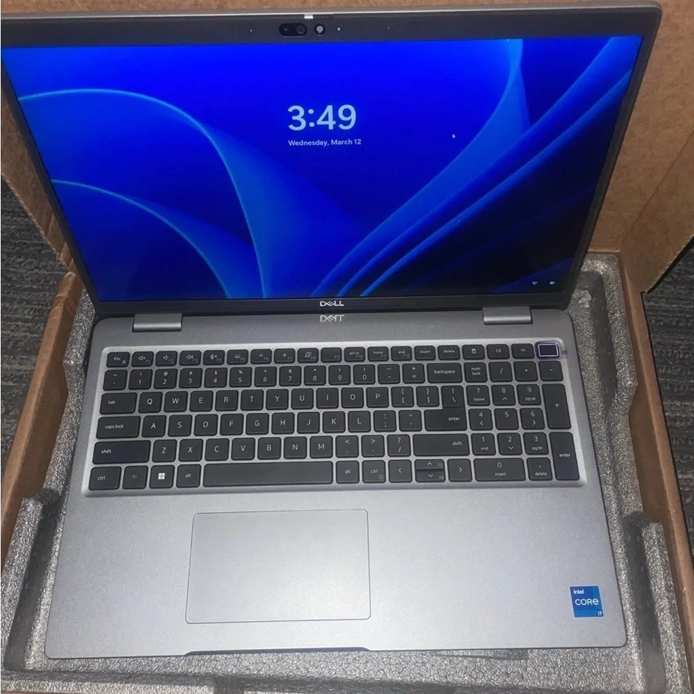 Dell Gray Laptop with Blue Display