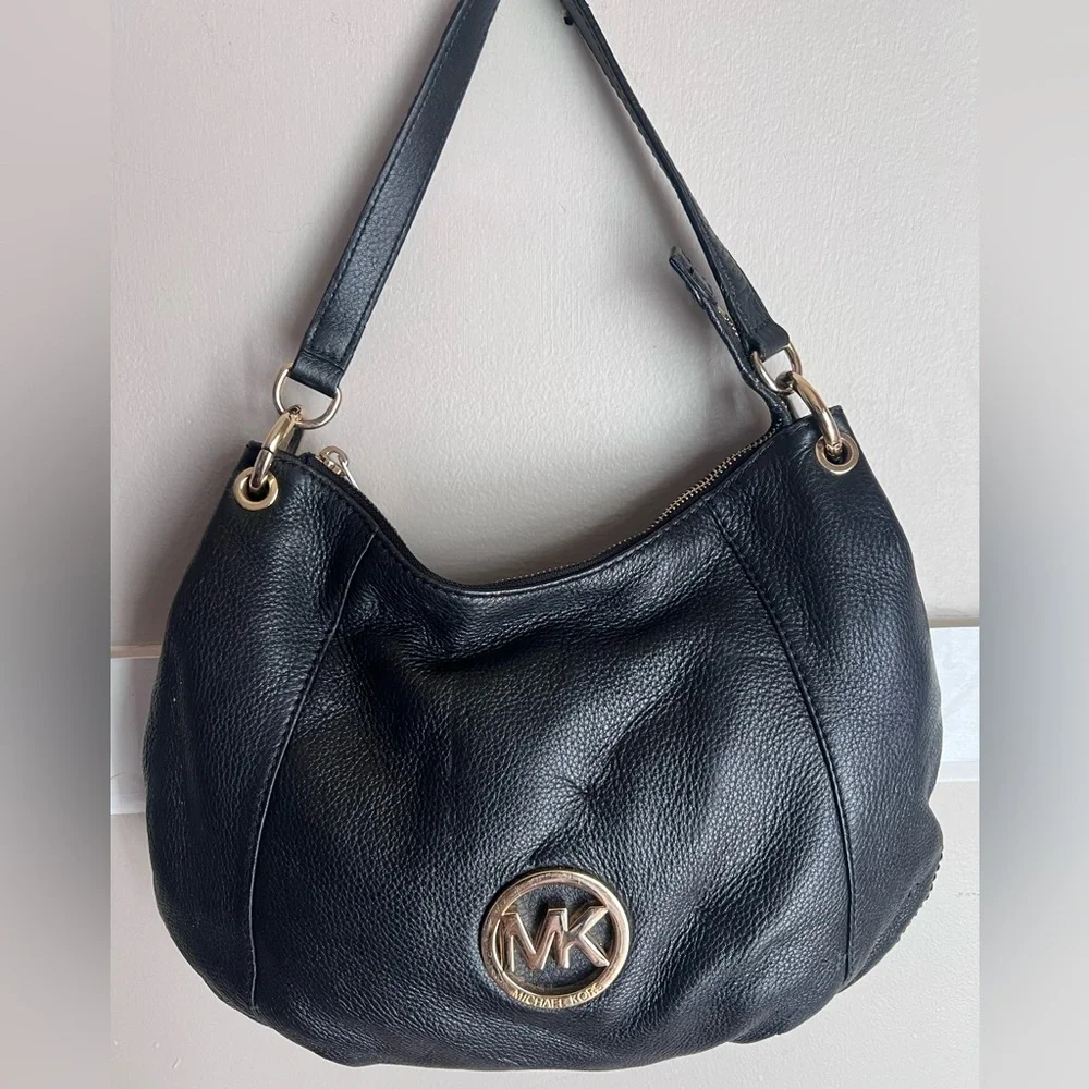Michael Kors Black Hobo Bag with Gold Accents