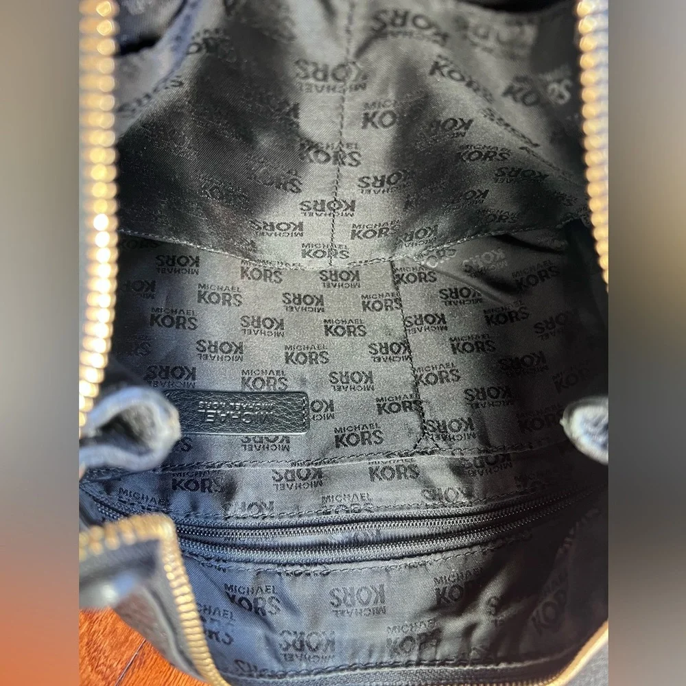 Michael Kors Black Hobo Bag with Gold Accents