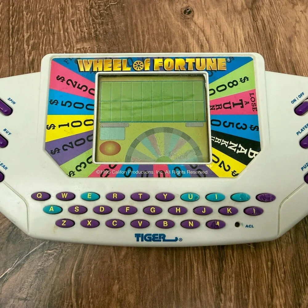 Vintage Wheel of Fortune Tiger Electronics Handheld Game 1995
