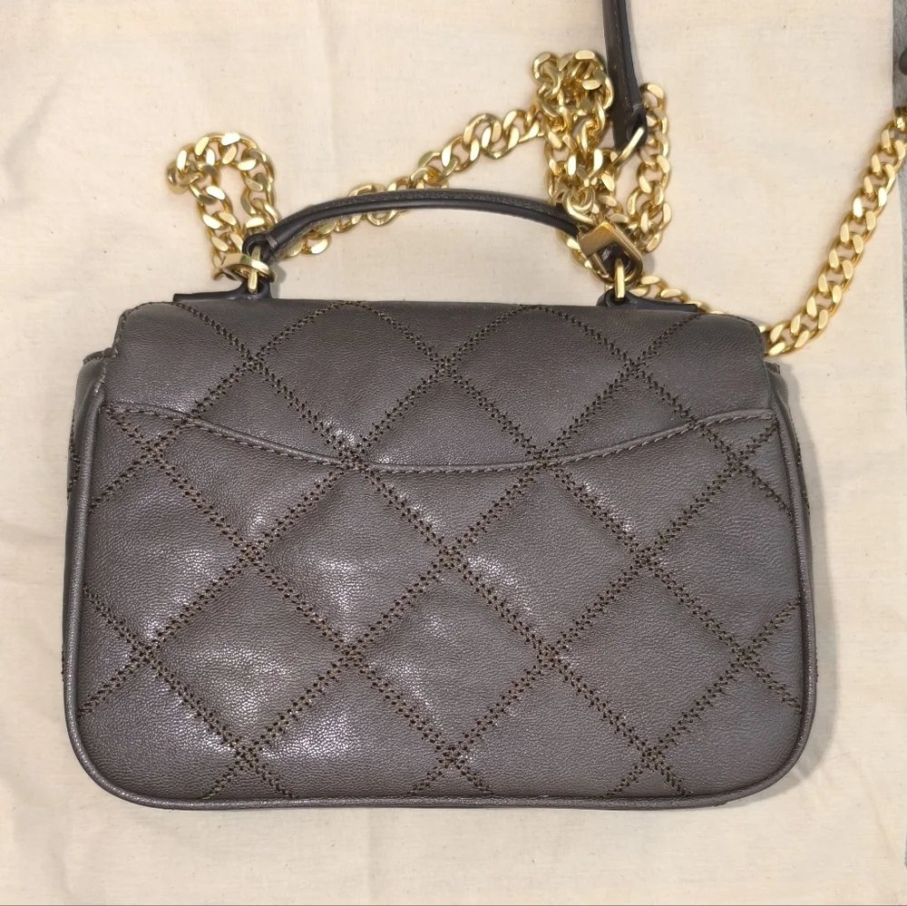 Tory Burch can charm