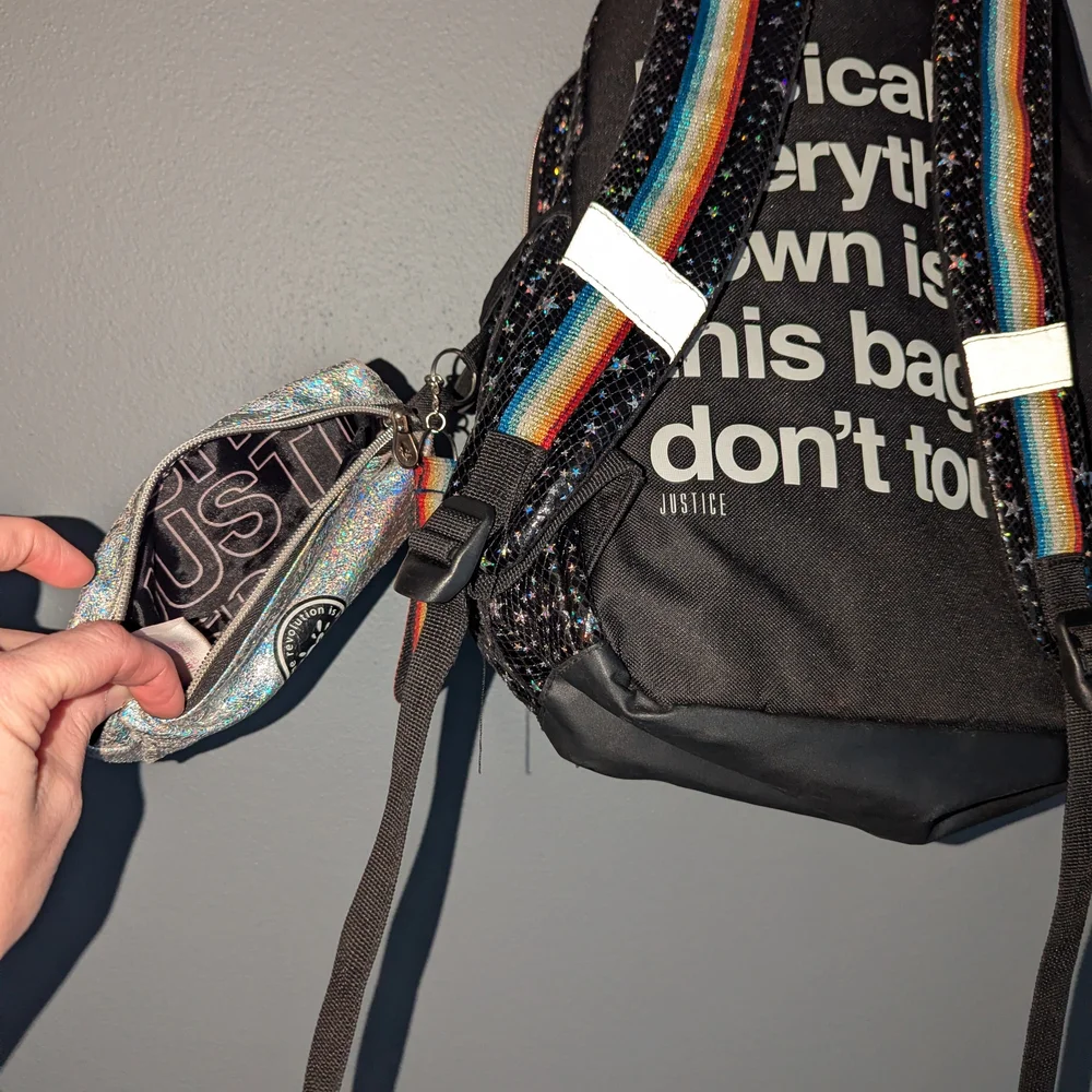 Justice Black Glitter Star Backpack with Rainbow Stripe