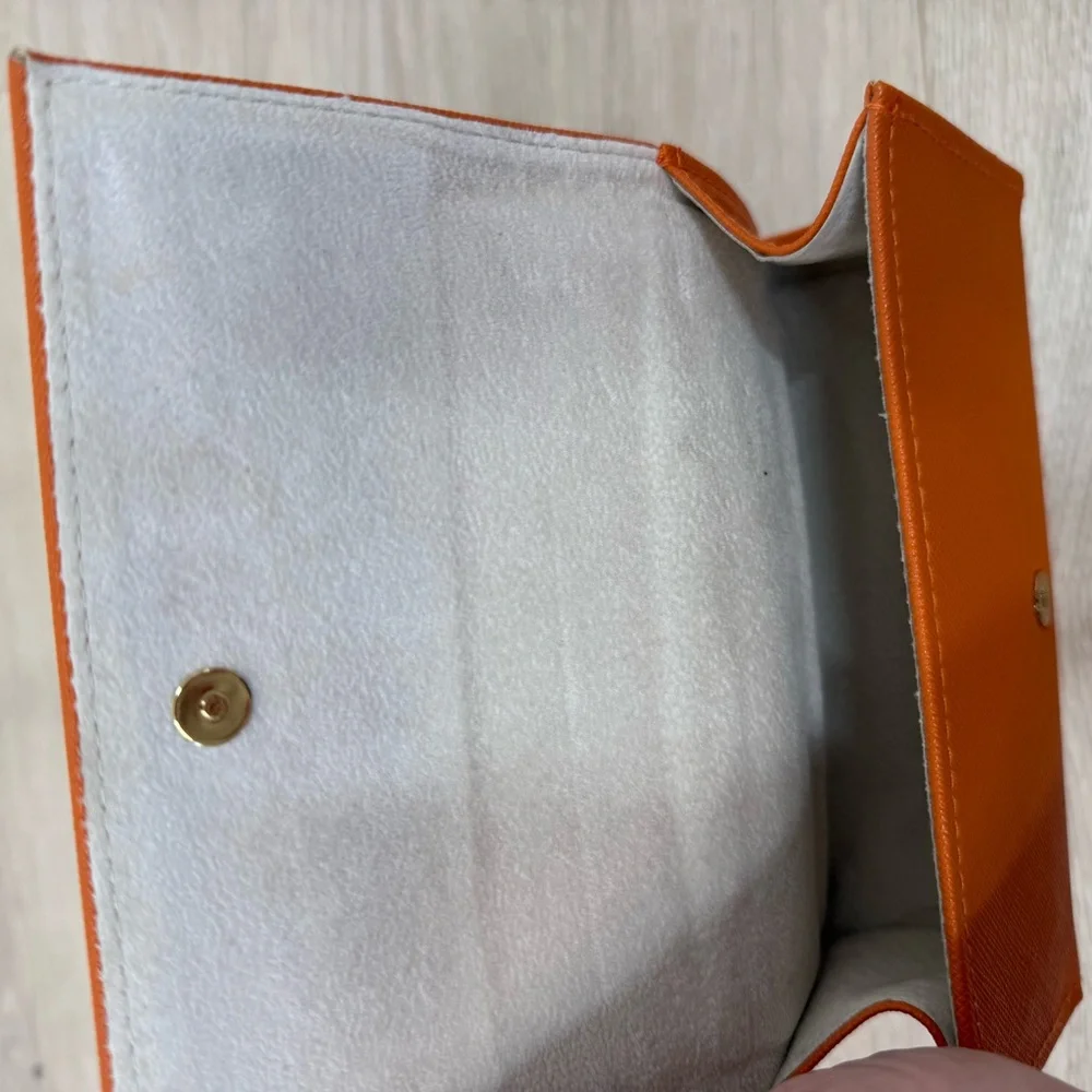 Tory Burch sunglasses orange case