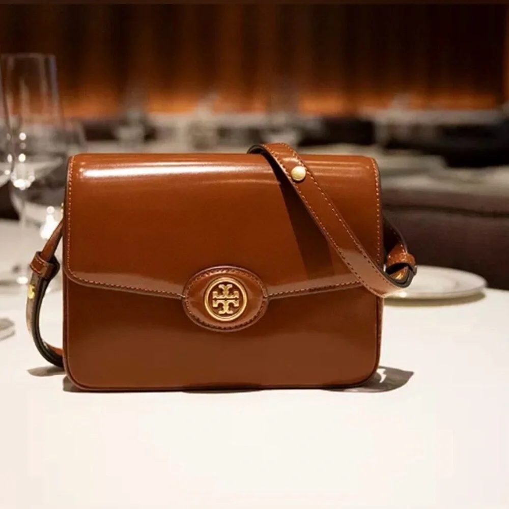 Tory Burch versatile sleek adjustable