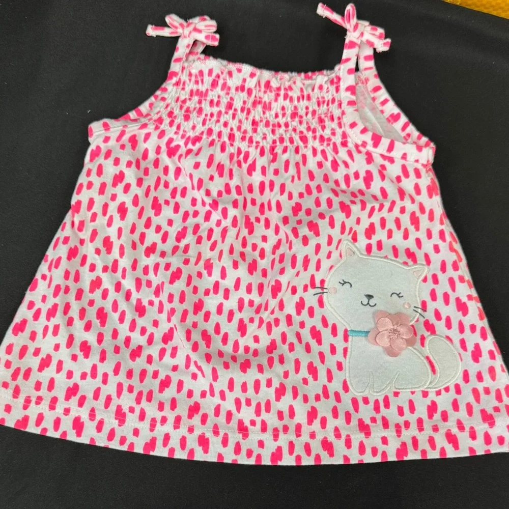Carters pink polka features