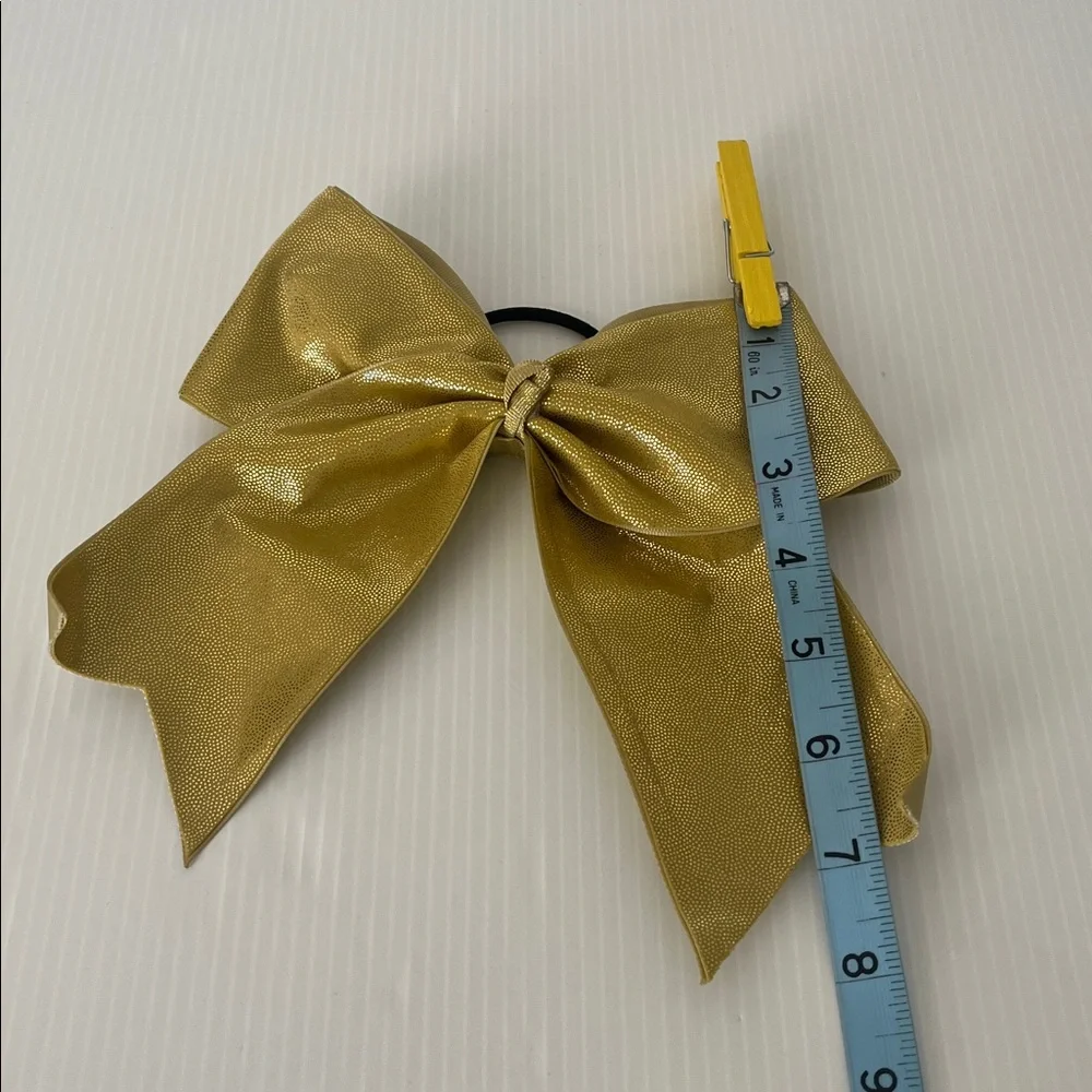 Varsity gold cheer