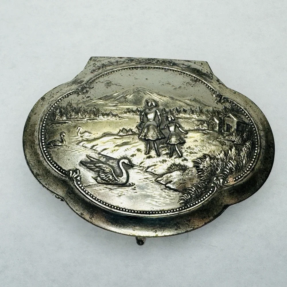 VTG Silver Metal Trinket Or Jewelry Box Lined W/ Red Velvet And An Embossed Top